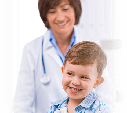 Smiling child with female pediatrician