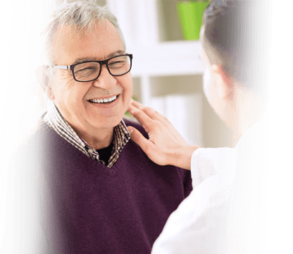 doctor calms his older patient