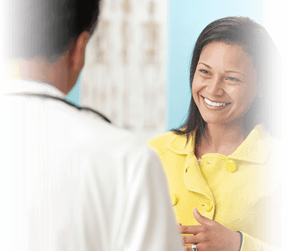 smiling patient listening to doctor